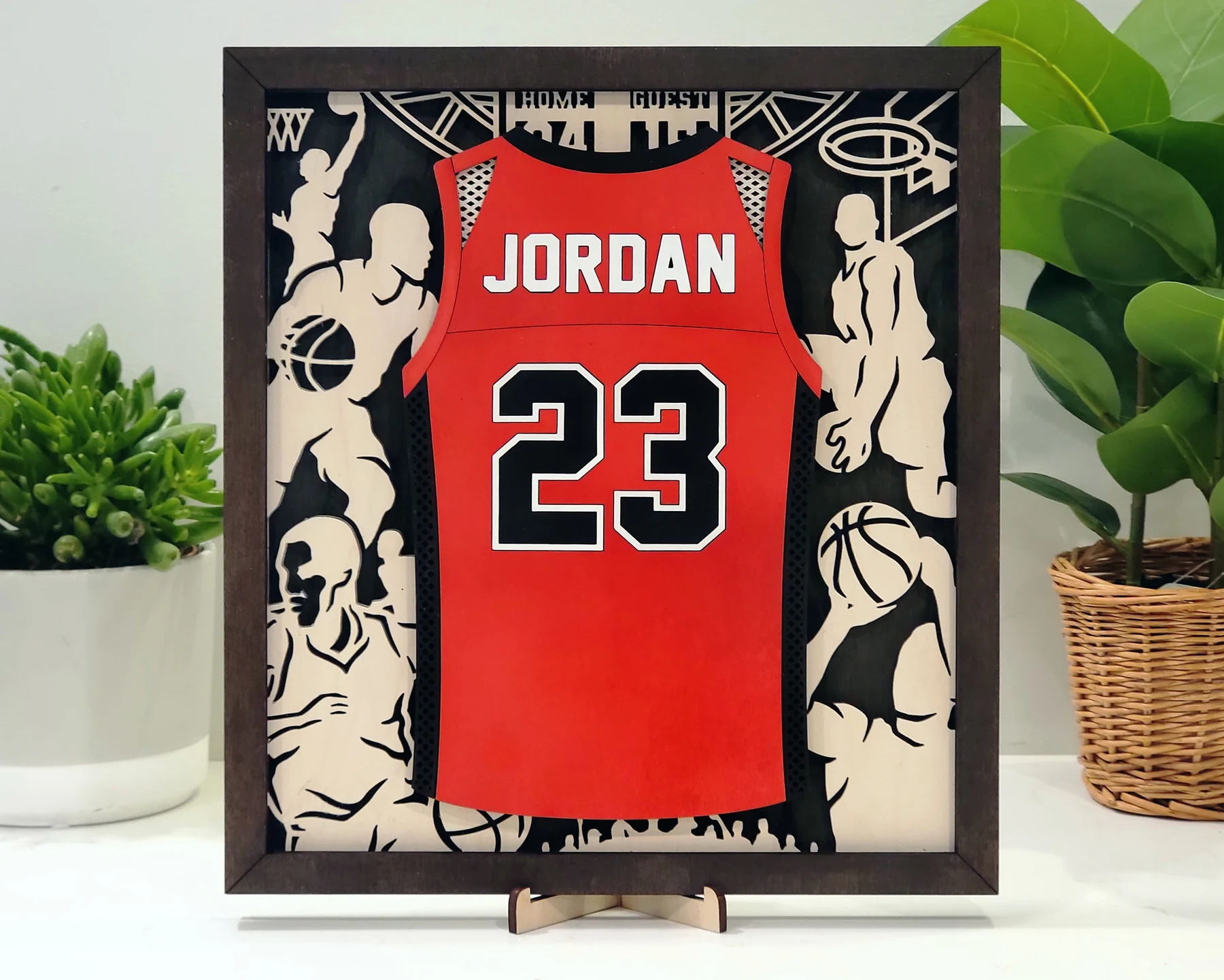 Supplier sample of a personalized layered basketball jersey display