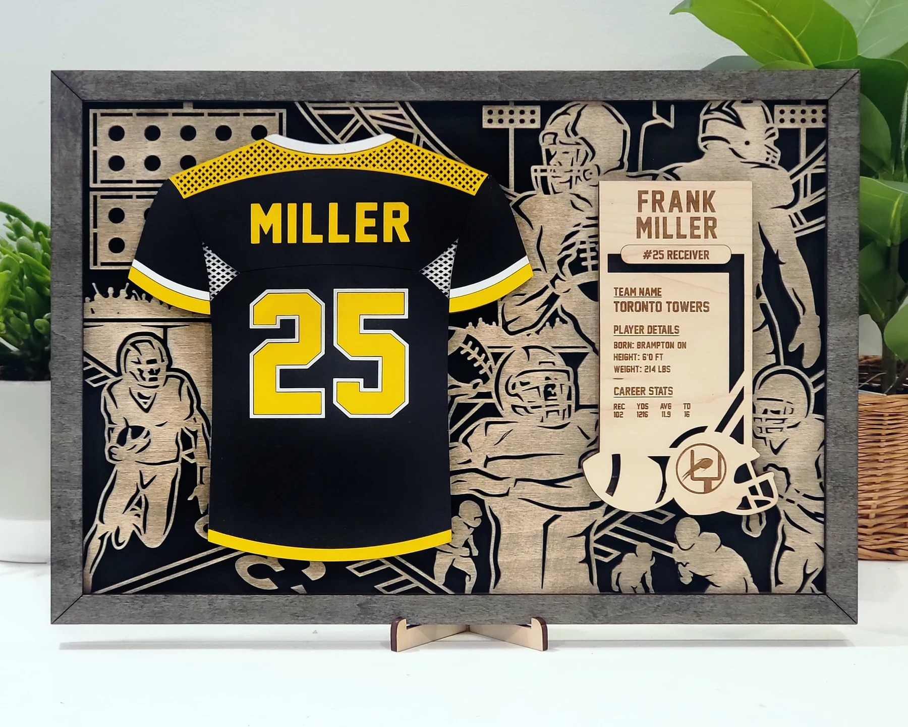 Supplier sample of a personalized layered football jersey display with card holder