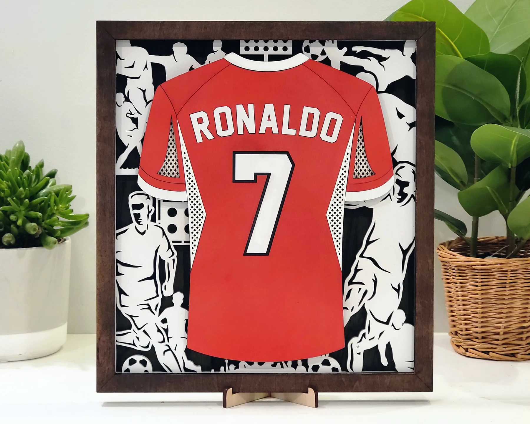 Supplier sample of a personalized layered soccer jersey display