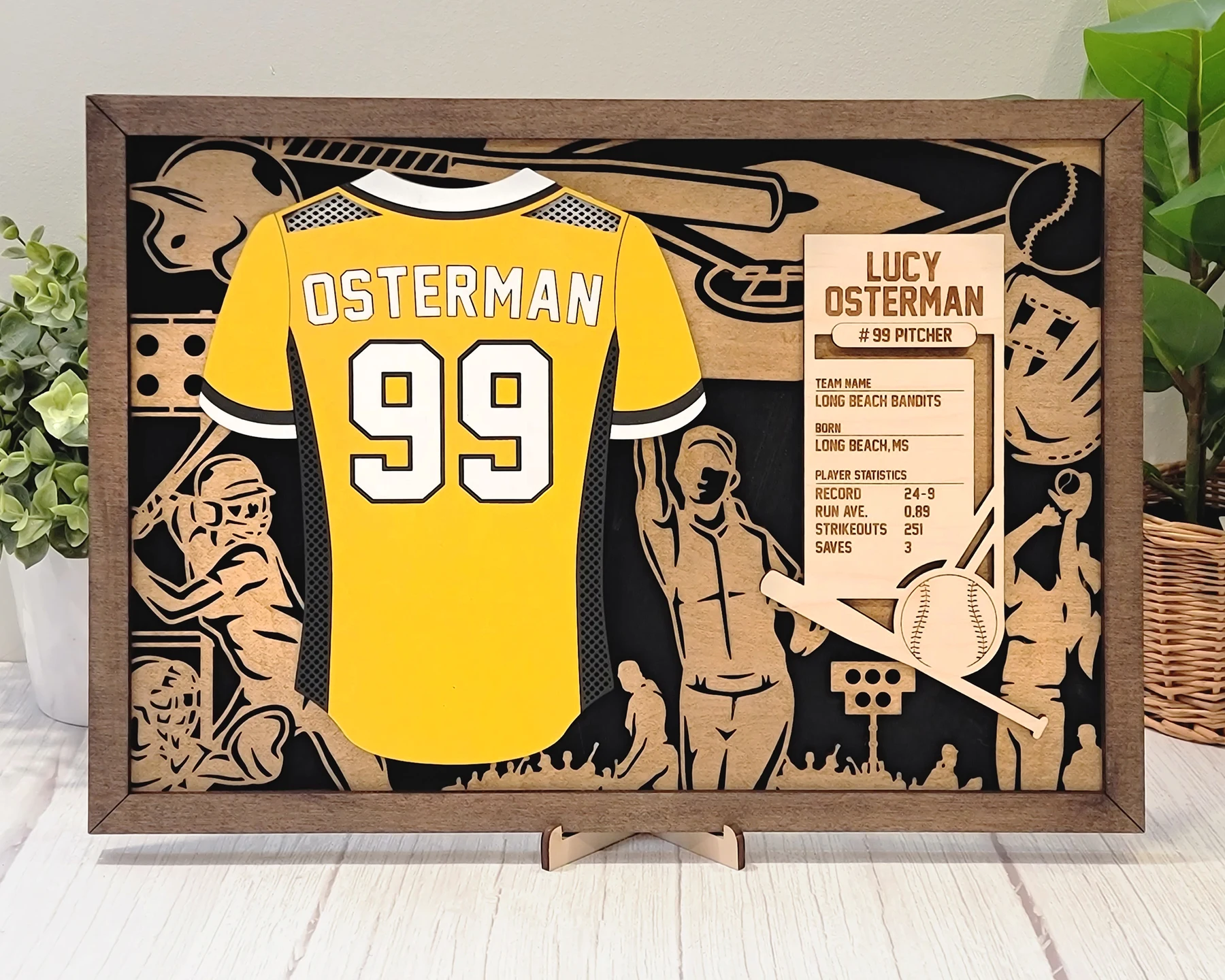 Supplier sample of a personalized layered softball jersey display with card holder
