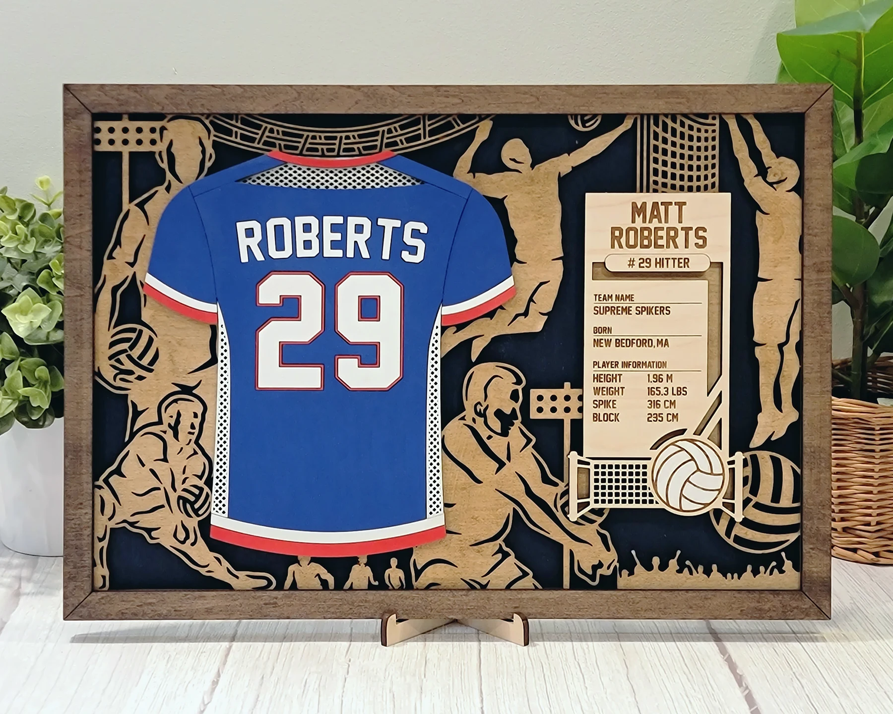 Supplier sample of a personalized layered volleyball jersey display with card holder